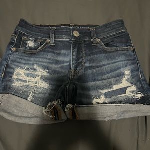Blue ripped jean shorts
